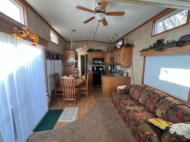 2795 East 28th Road Marseilles, IL 61341 - Photo 6 of 60 a living room with furniture and a chandelier