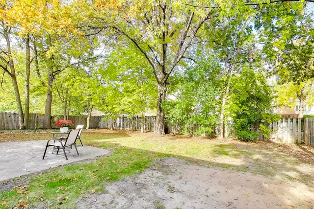 a garden view with a seating space