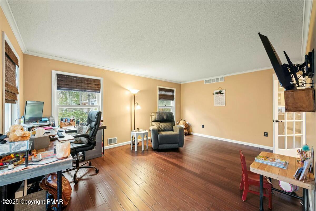 1295 Scotrun Drive Scotrun, PA 18355 - Photo 11 of 76 a living room with furniture and a large window
