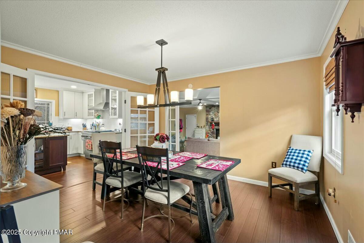 1295 Scotrun Drive Scotrun, PA 18355 - Photo 13 of 76 a view of a dining room with furniture window and outside view