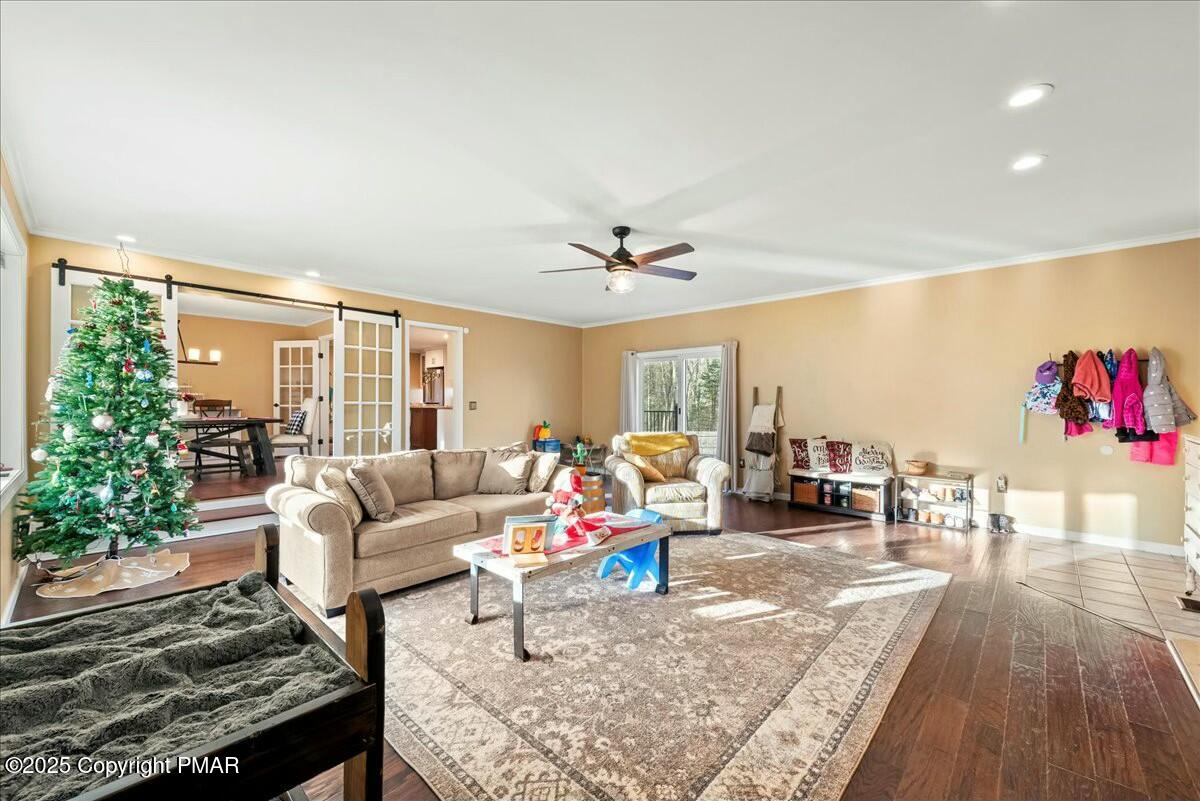 1295 Scotrun Drive Scotrun, PA 18355 - Photo 19 of 76 a living room with furniture and wooden floor