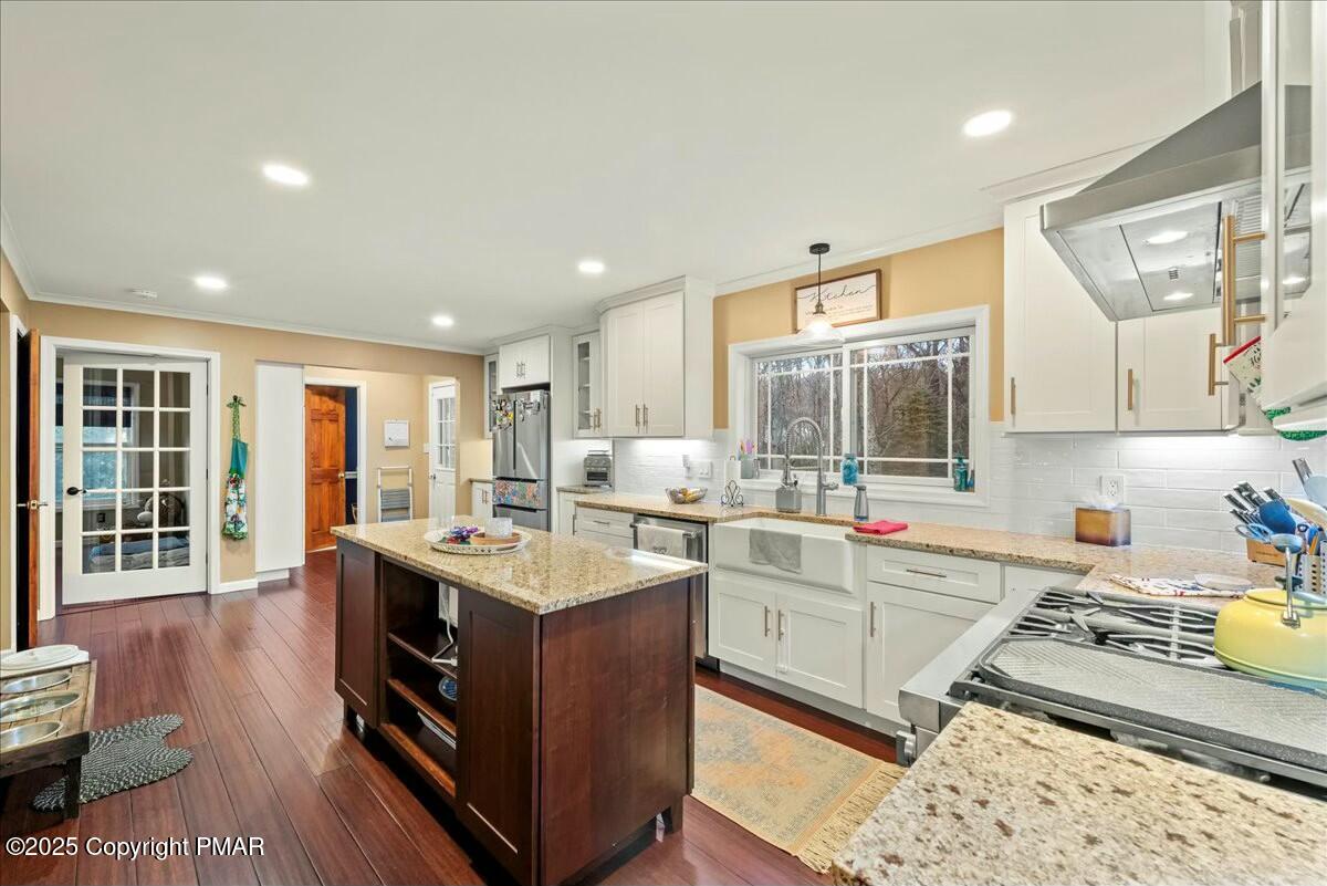 1295 Scotrun Drive Scotrun, PA 18355 - Photo 20 of 76 a kitchen with a sink stove and cabinets