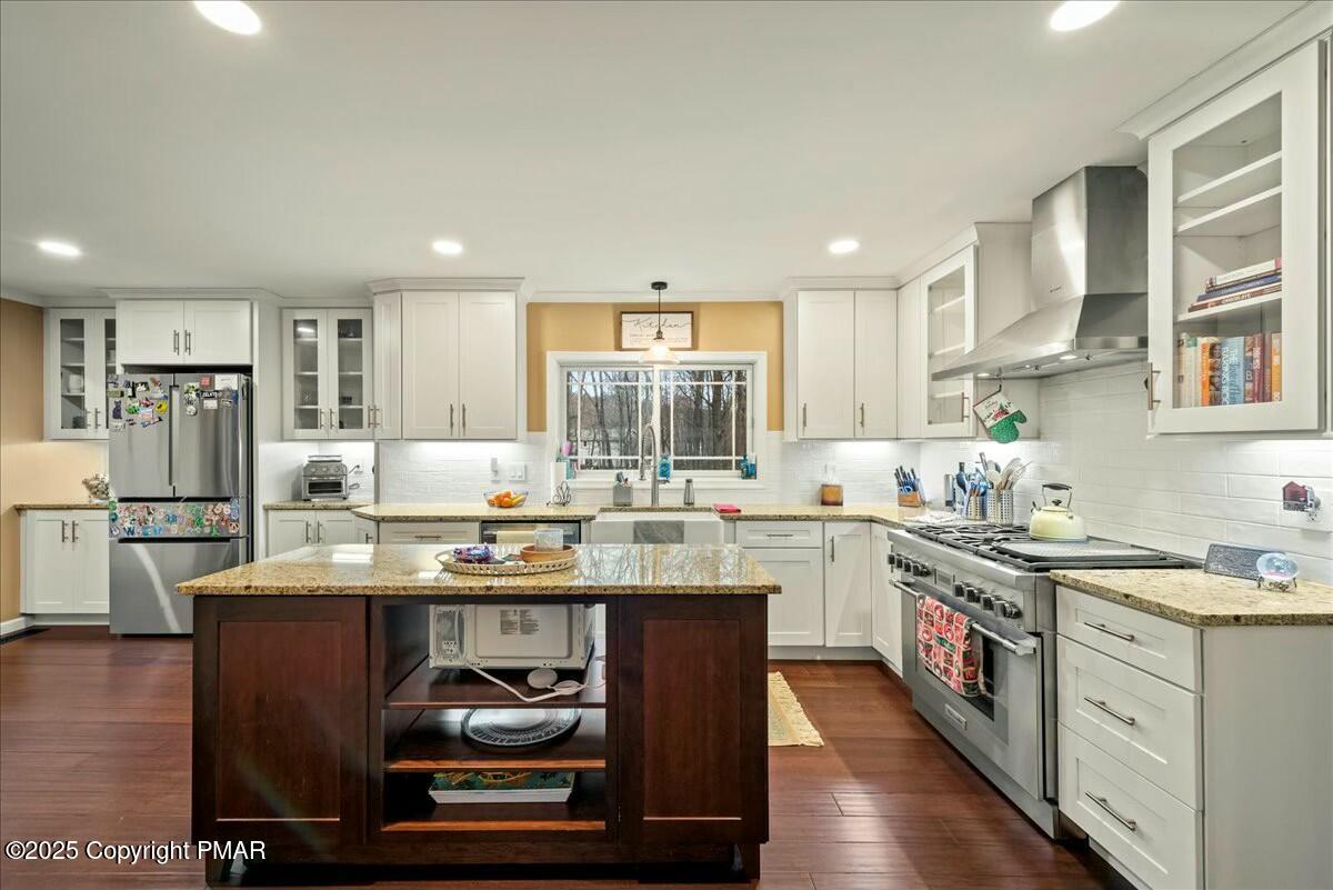 1295 Scotrun Drive Scotrun, PA 18355 - Photo 21 of 76 a kitchen with stainless steel appliances granite countertop a stove a sink dishwasher and a refrigerator