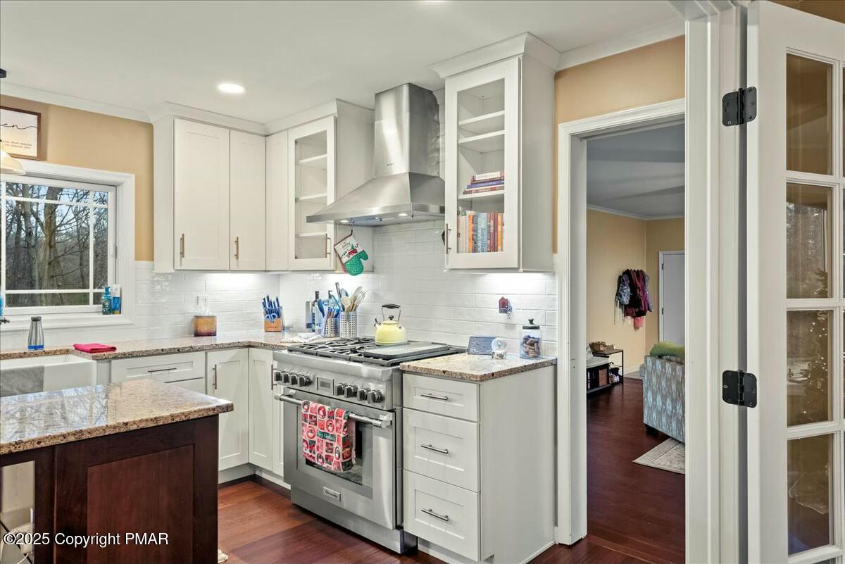 1295 Scotrun Drive Scotrun, PA 18355 - Photo 22 of 76 a kitchen with a sink stove and cabinets