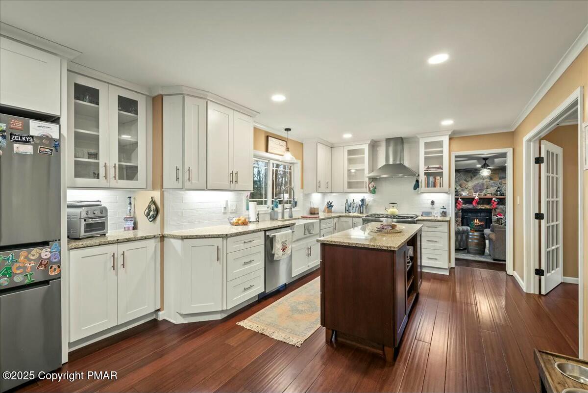 1295 Scotrun Drive Scotrun, PA 18355 - Photo 23 of 76 a kitchen with a sink window and cabinets