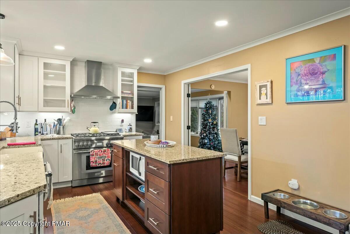 1295 Scotrun Drive Scotrun, PA 18355 - Photo 27 of 76 a kitchen with kitchen island a stove a sink and a refrigerator