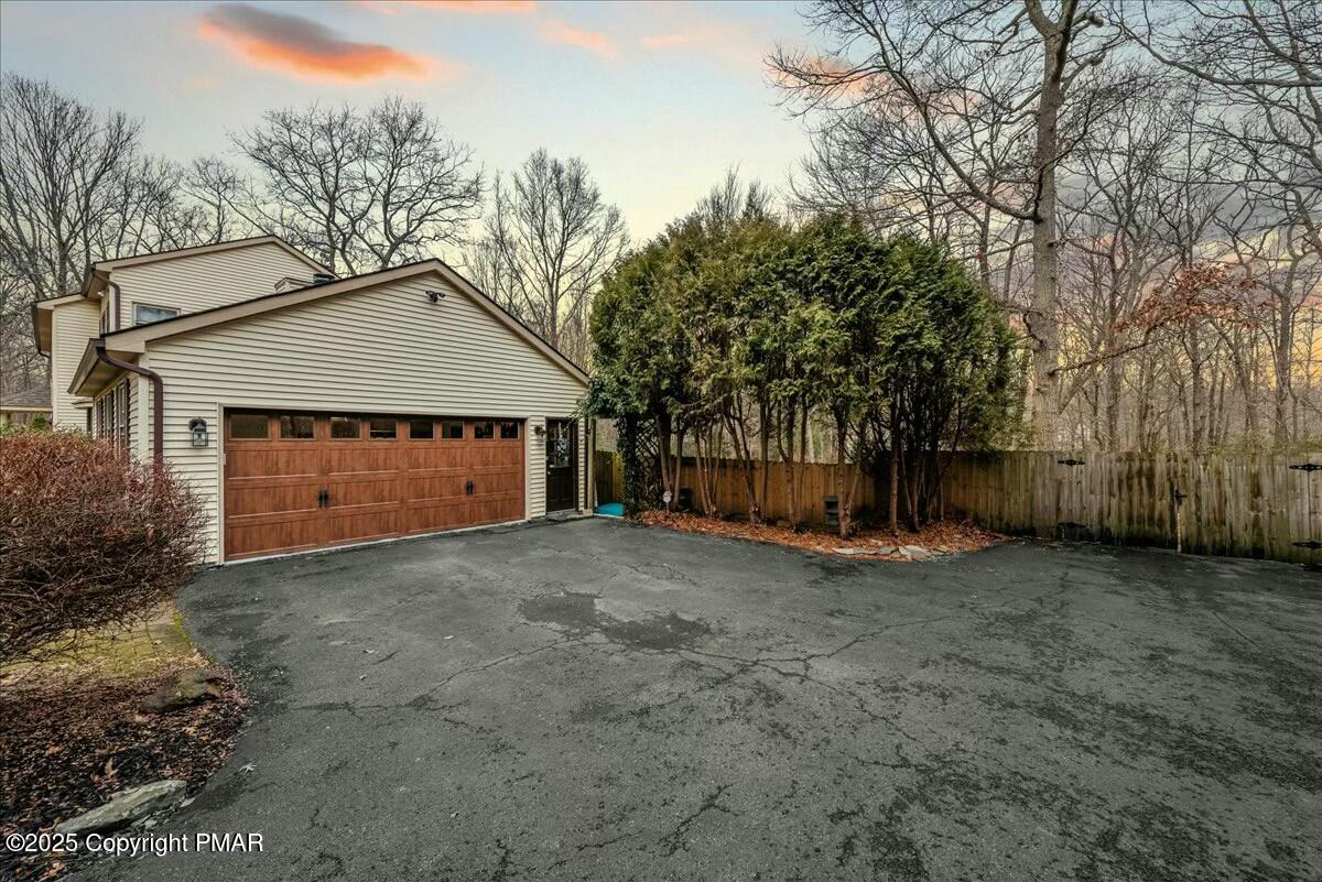 1295 Scotrun Drive Scotrun, PA 18355 - Photo 3 of 76 a view of a house with a yard and garage