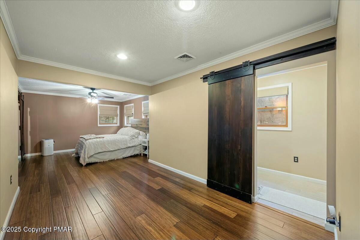 1295 Scotrun Drive Scotrun, PA 18355 - Photo 47 of 76 a bedroom with a bed and a window