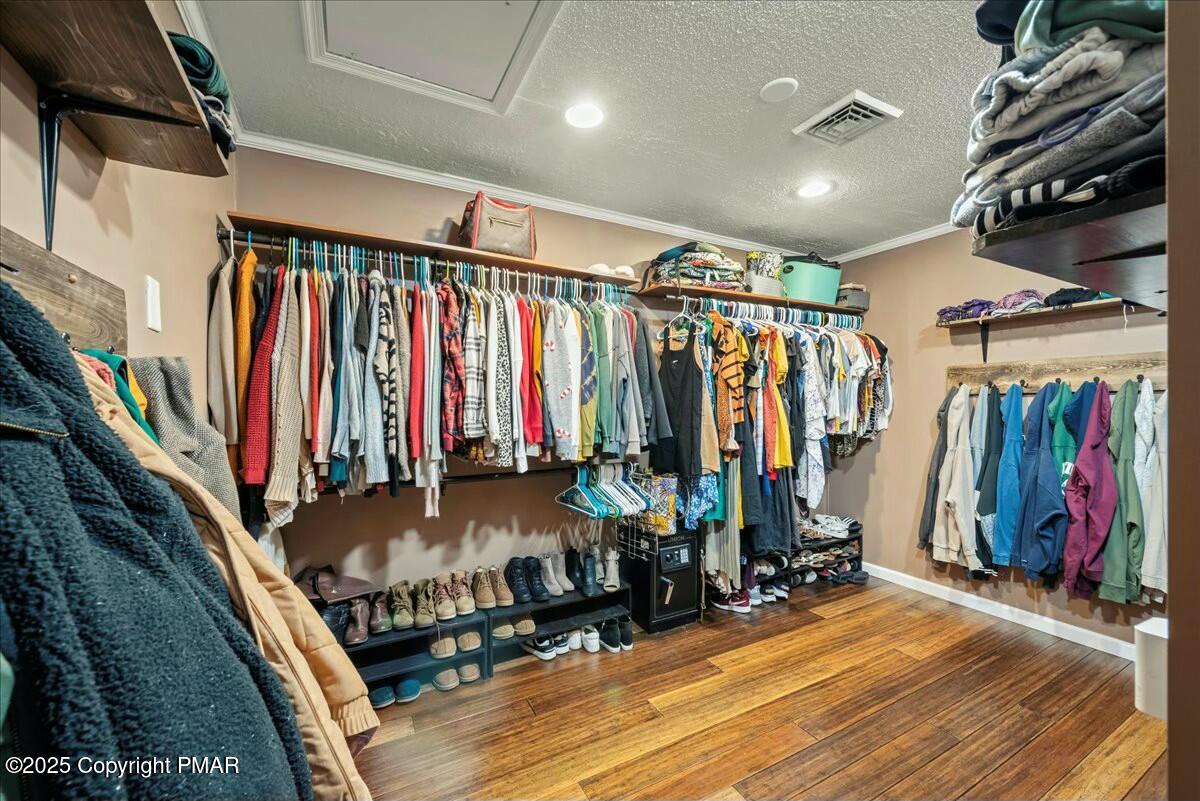 1295 Scotrun Drive Scotrun, PA 18355 - Photo 53 of 76 a view of walk in closet with clothes