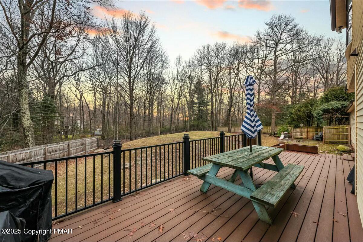 1295 Scotrun Drive Scotrun, PA 18355 - Photo 6 of 76 a view of a wooden deck with furniture