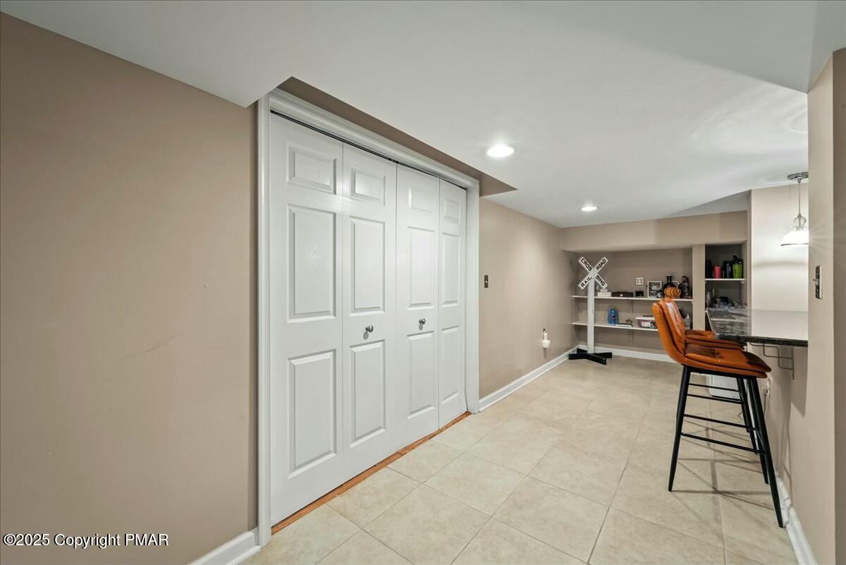 1295 Scotrun Drive Scotrun, PA 18355 - Photo 62 of 76 a view of a hallway with furniture and a window
