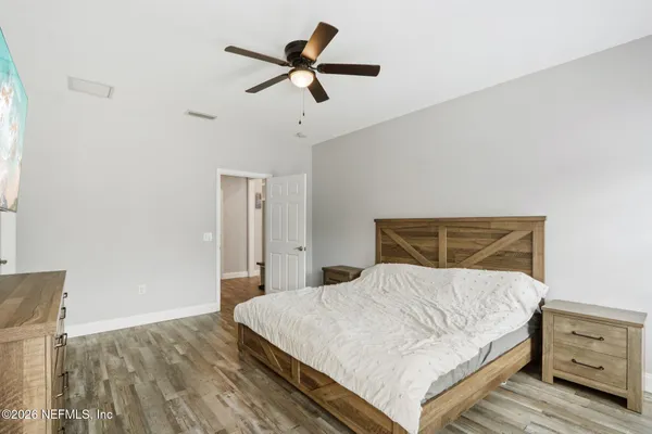 a bathroom with a sink a vanity and a mirror