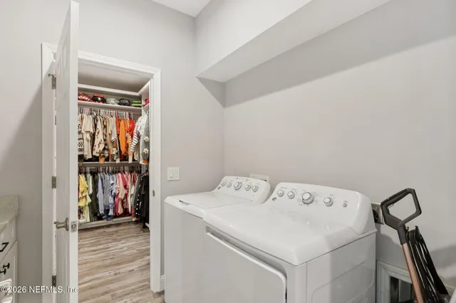 a view of a livingroom with furniture and workspace