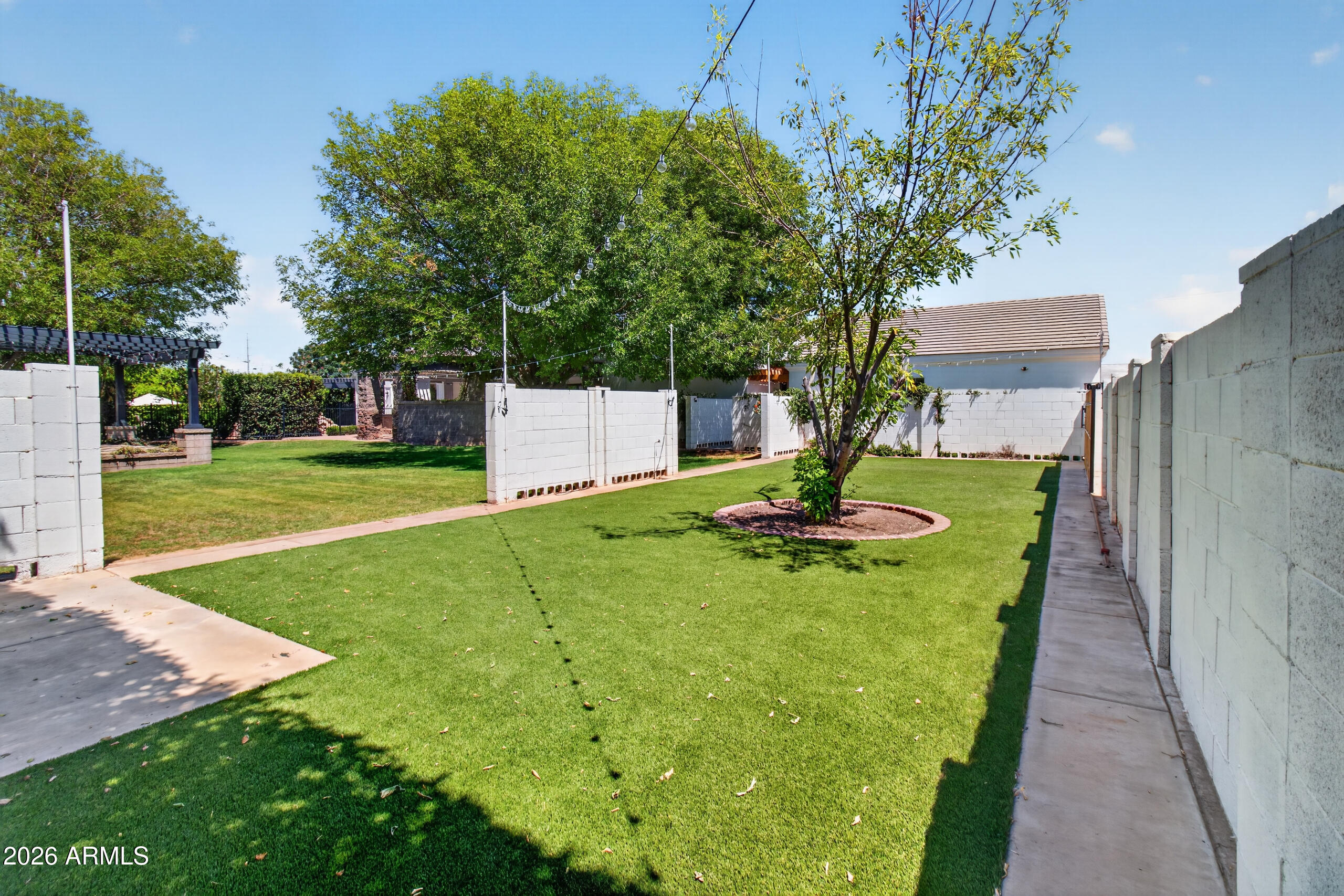 2677 East Queen Creek Road Gilbert, AZ 85297 - Photo 101 of 128 a view of a park with large trees