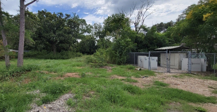 6415 S. F. Austin Road Jones Creek, TX 77541 - Photo 9 of 11 a view of a back yard