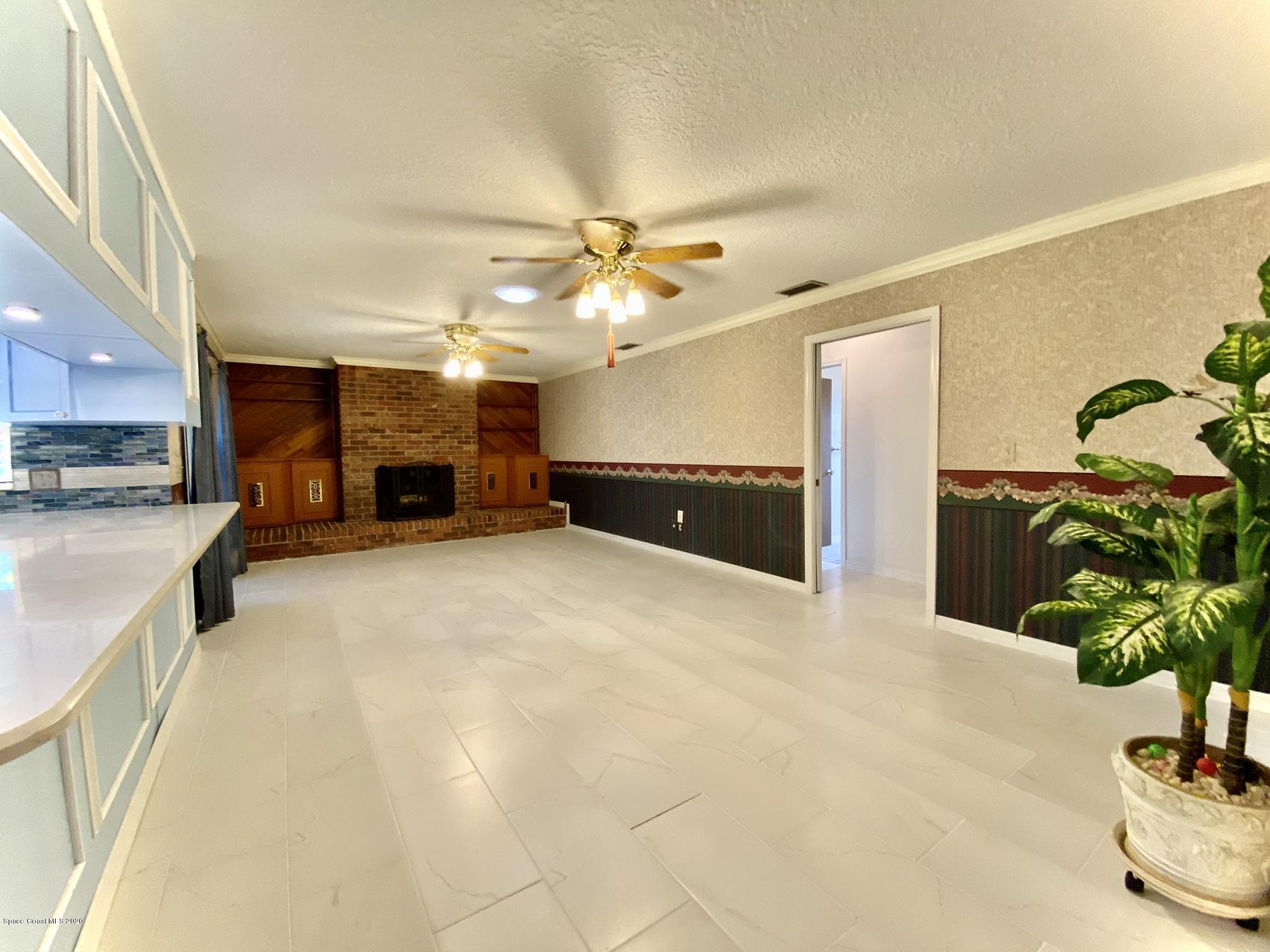 5282 Bridge Road Cocoa, FL 32927 - Photo 11 of 47 Wood Burning Fireplace