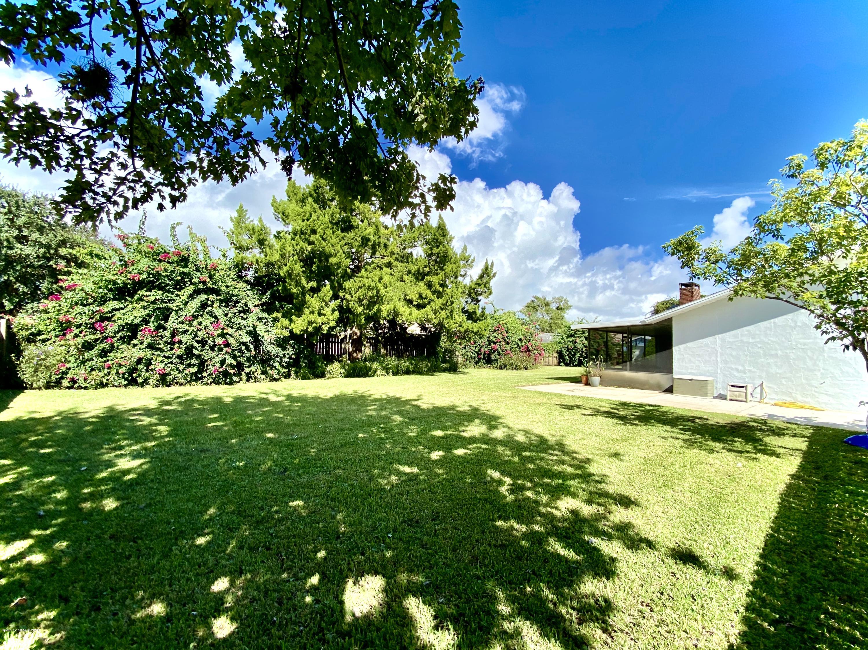 5282 Bridge Road Cocoa, FL 32927 - Photo 23 of 47 Fenced Backyard with Drive Gate