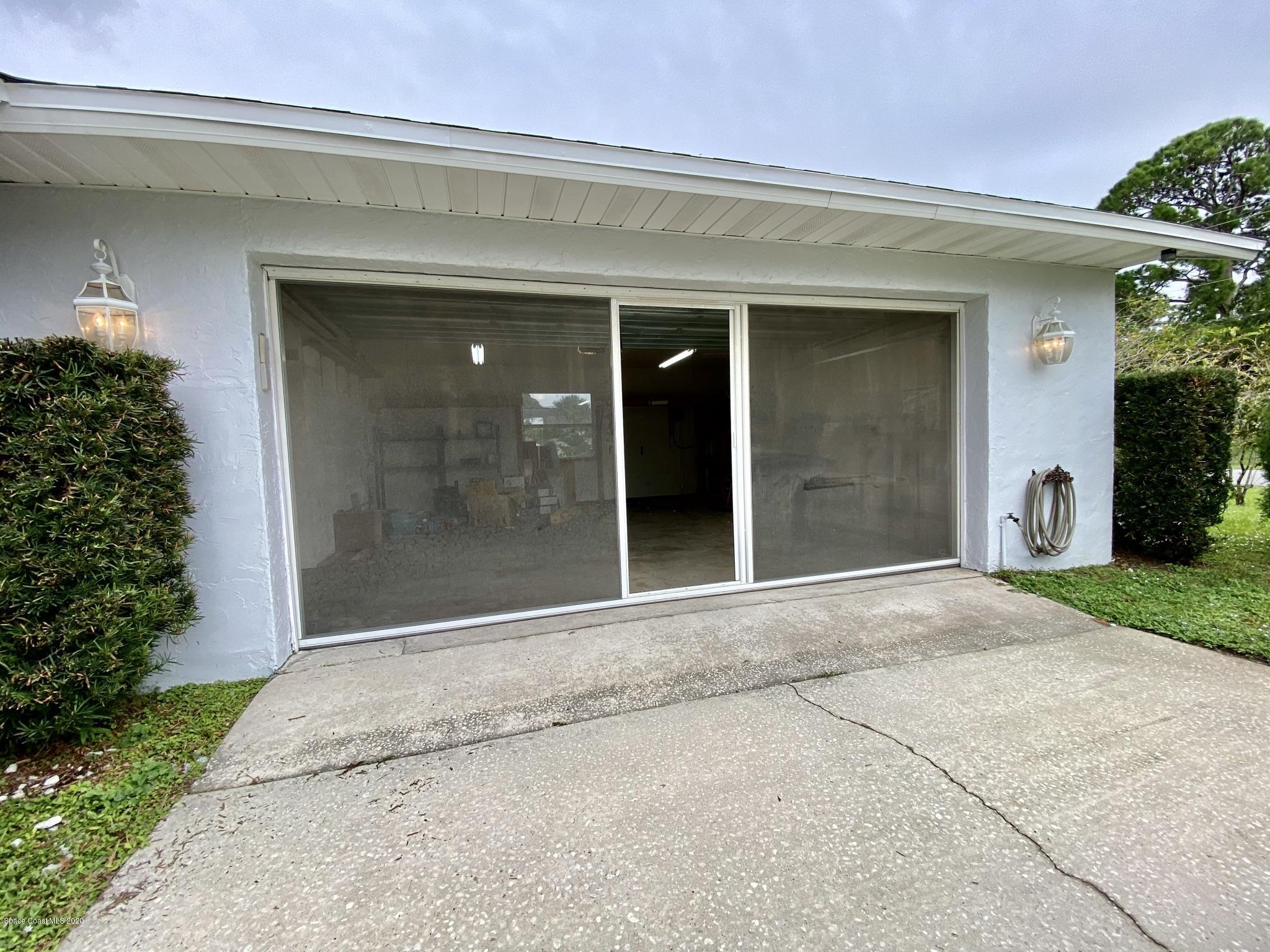 5282 Bridge Road Cocoa, FL 32927 - Photo 35 of 47 New Screen "Breezeway" Door
