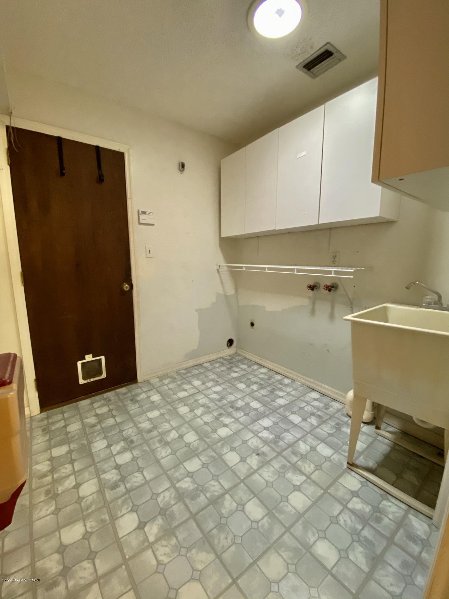 5282 Bridge Road Cocoa, FL 32927 - Photo 40 of 47 Indoor Utility Room