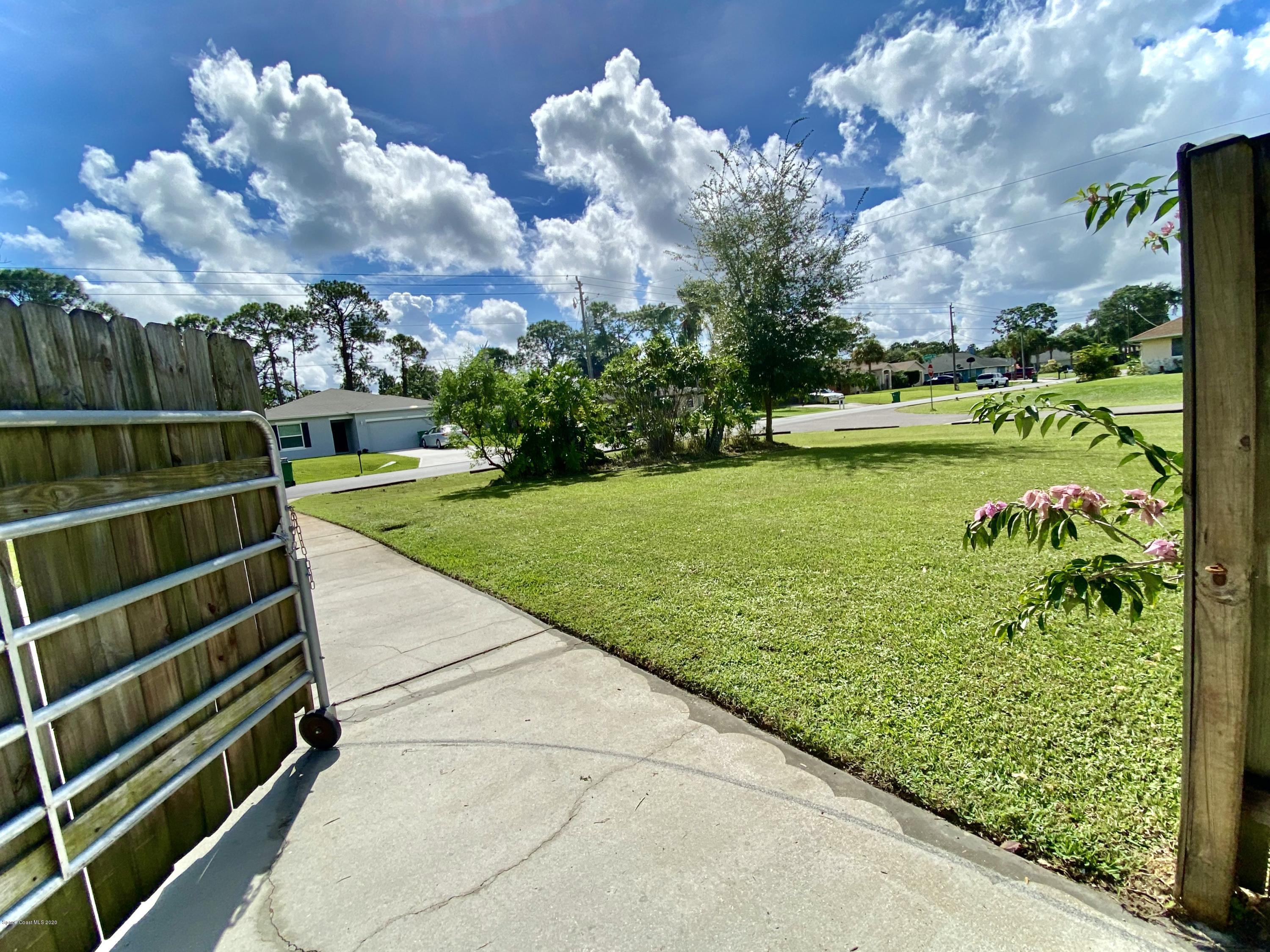 5282 Bridge Road Cocoa, FL 32927 - Photo 43 of 47 Drive Gate to Backyard