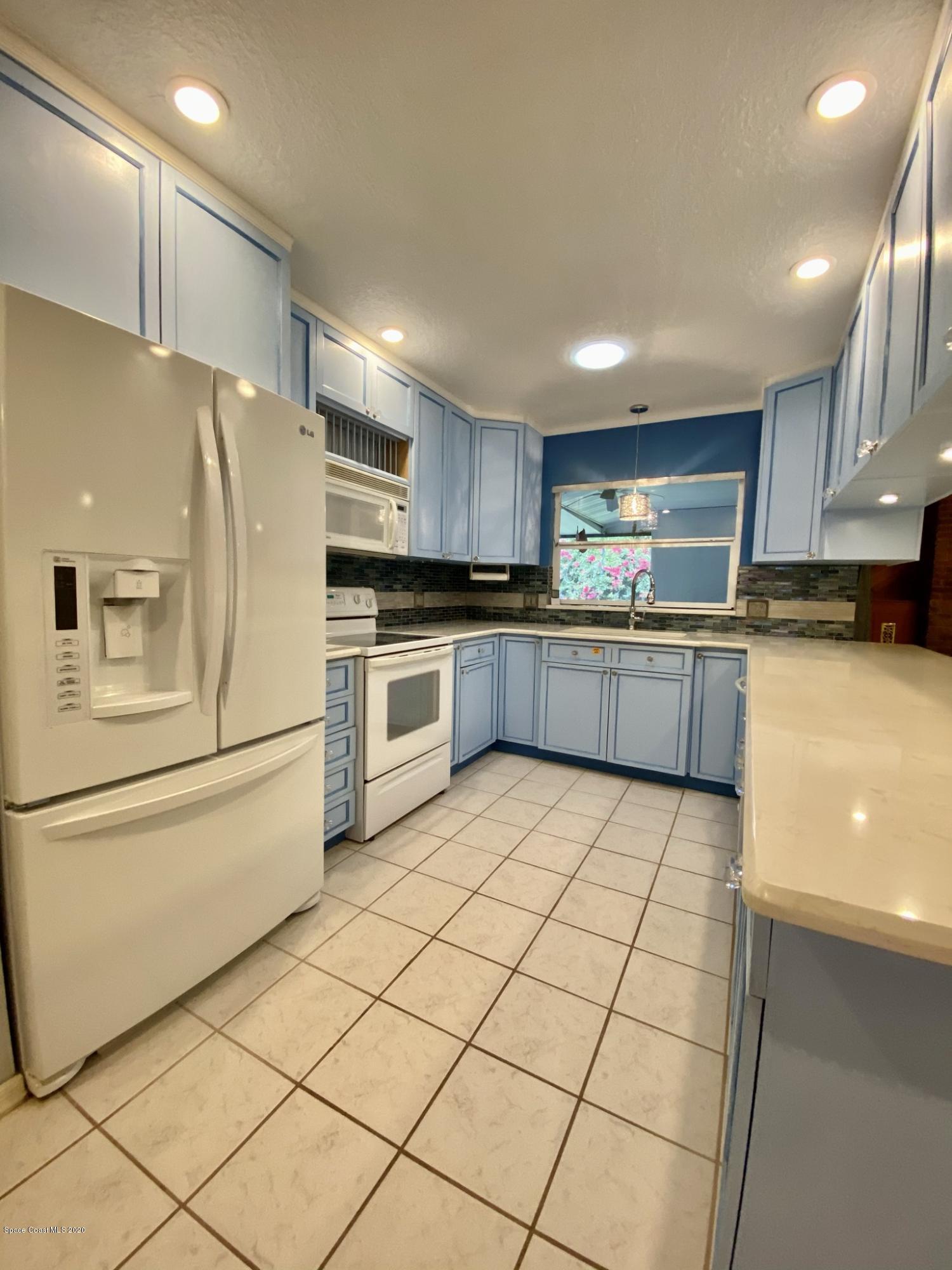 5282 Bridge Road Cocoa, FL 32927 - Photo 7 of 47 Gorgeous Lighting Throughout