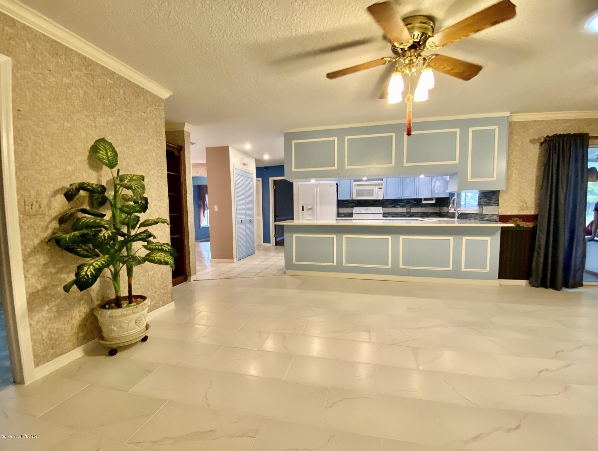 5282 Bridge Road Cocoa, FL 32927 - Photo 10 of 47 New Tile in Family Room