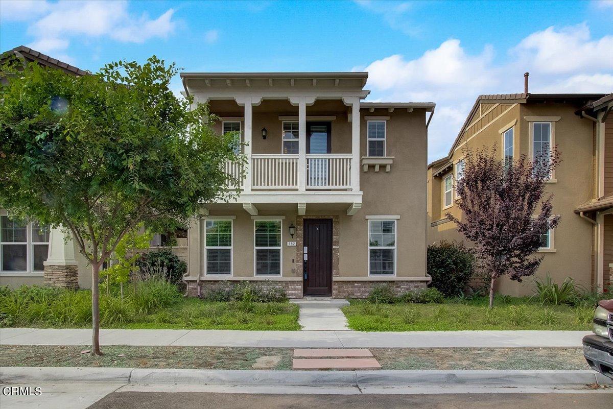 182 Stonegate Road Camarillo, CA 93010 - Photo 2 of 41 a front view of a house with a garden