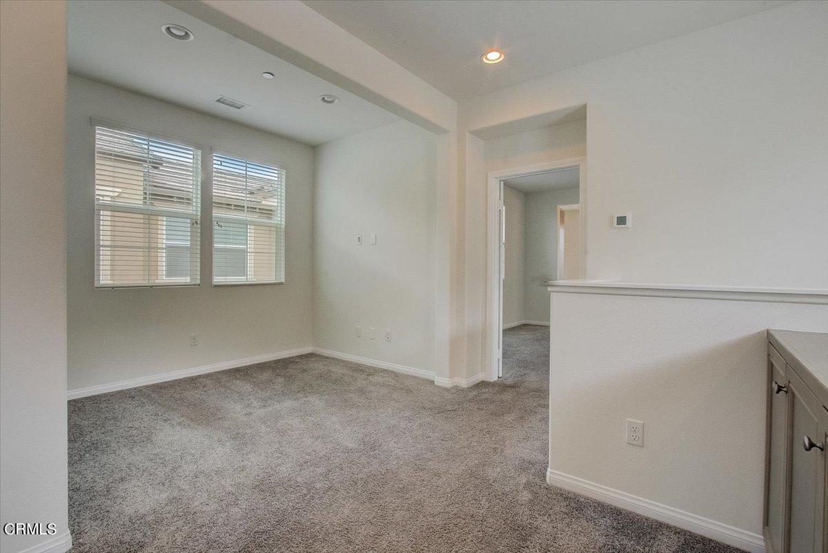 182 Stonegate Road Camarillo, CA 93010 - Photo 16 of 41 an empty room with windows
