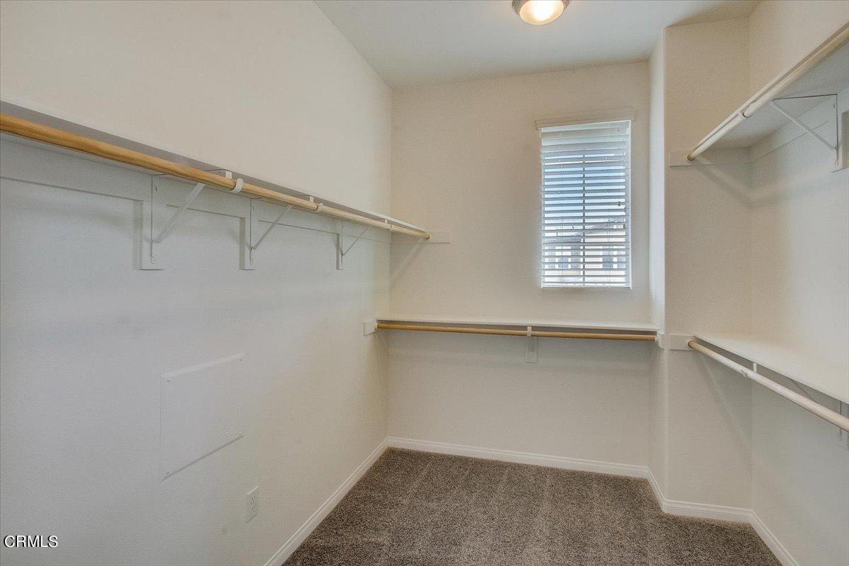 182 Stonegate Road Camarillo, CA 93010 - Photo 30 of 41 a view of a room with rack on the wall