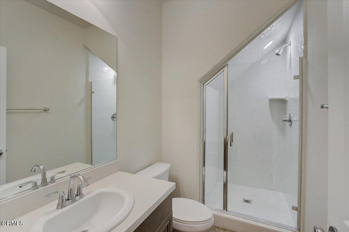 182 Stonegate Road Camarillo, CA 93010 - Photo 31 of 41 a bathroom with a sink toilet and shower