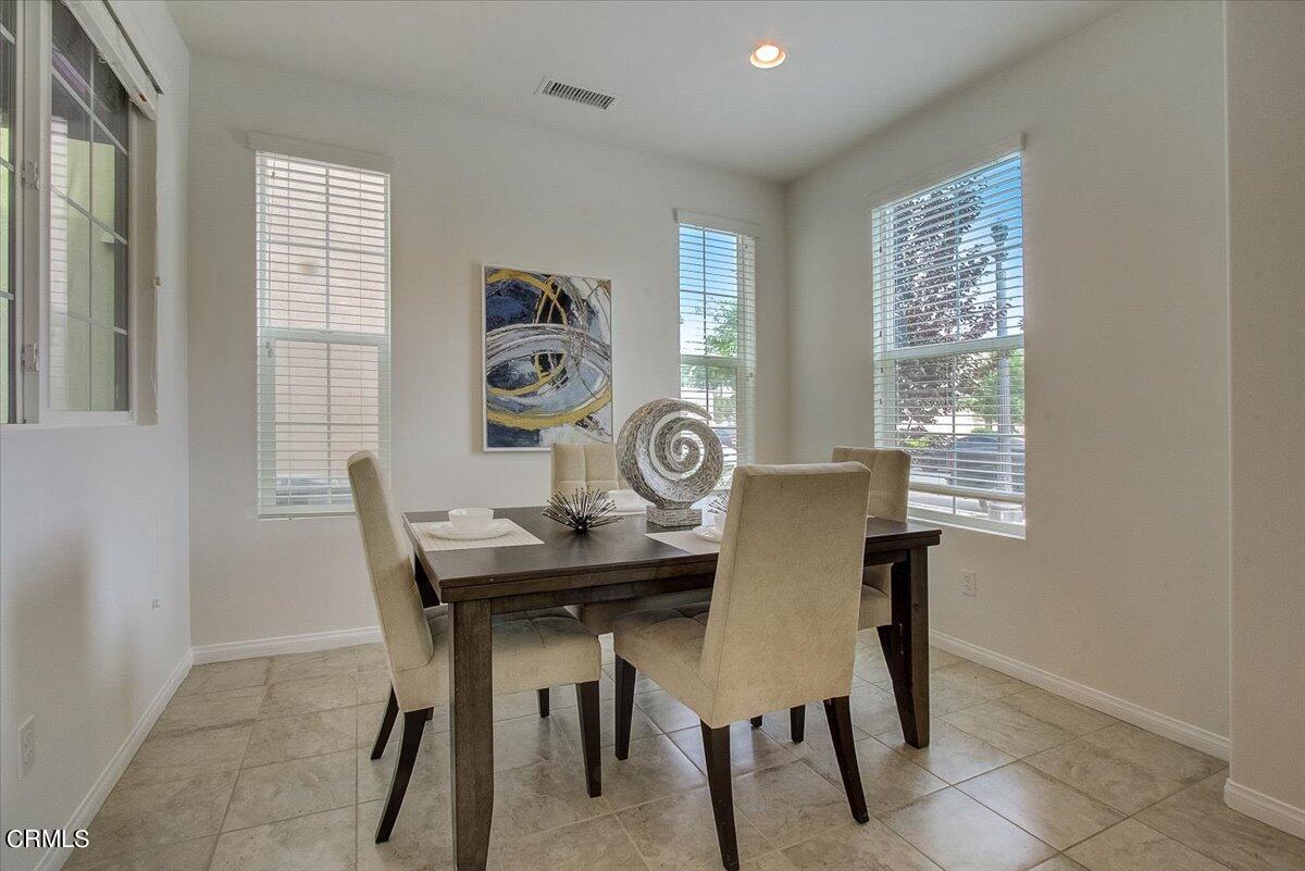 182 Stonegate Road Camarillo, CA 93010 - Photo 5 of 41 a view of a dining room with furniture window and outside view