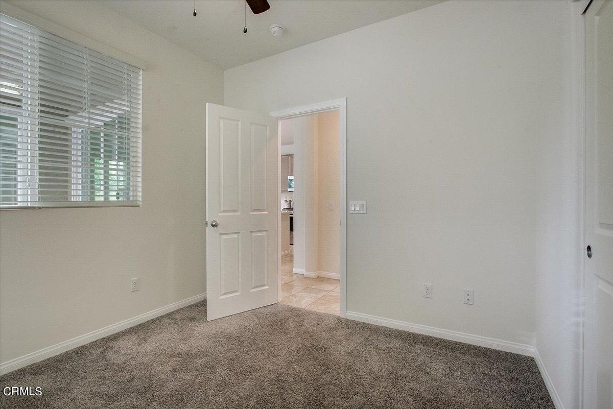182 Stonegate Road Camarillo, CA 93010 - Photo 8 of 41 an empty room with windows