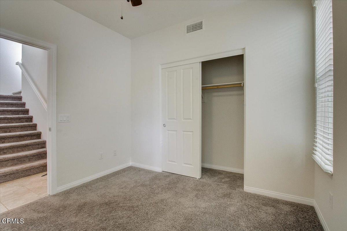 182 Stonegate Road Camarillo, CA 93010 - Photo 9 of 41 a view of an empty room with stairs
