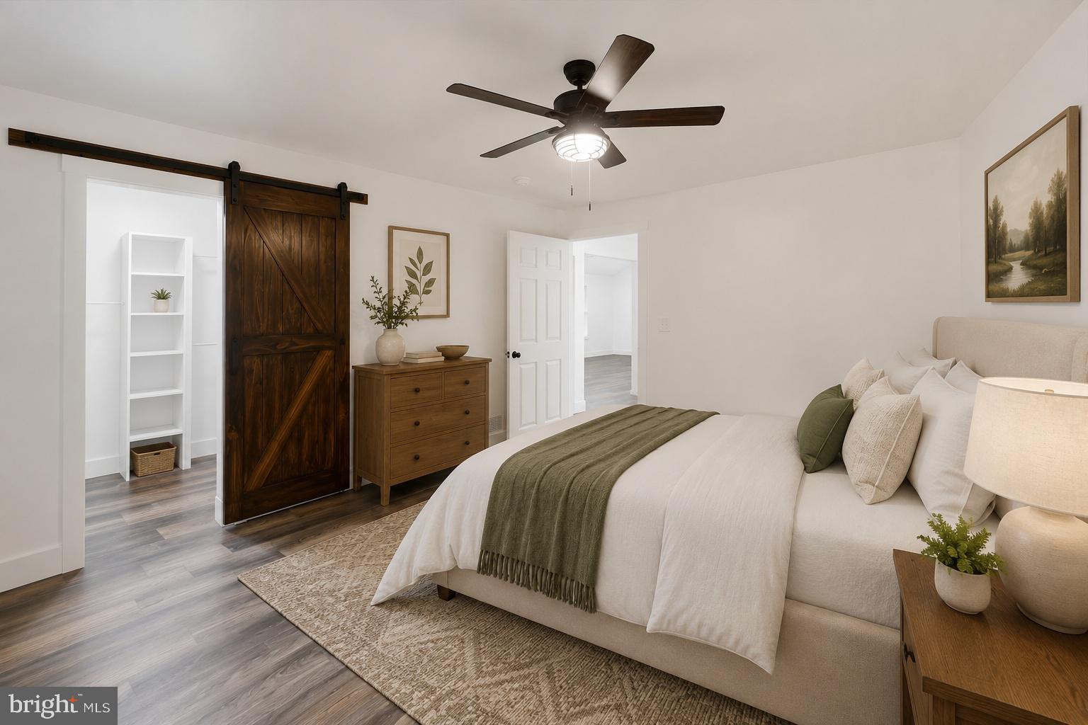 18985 Hebel Road Stewartstown, PA 17363 - Photo 31 of 42 Serene bedroom with rustic charm.