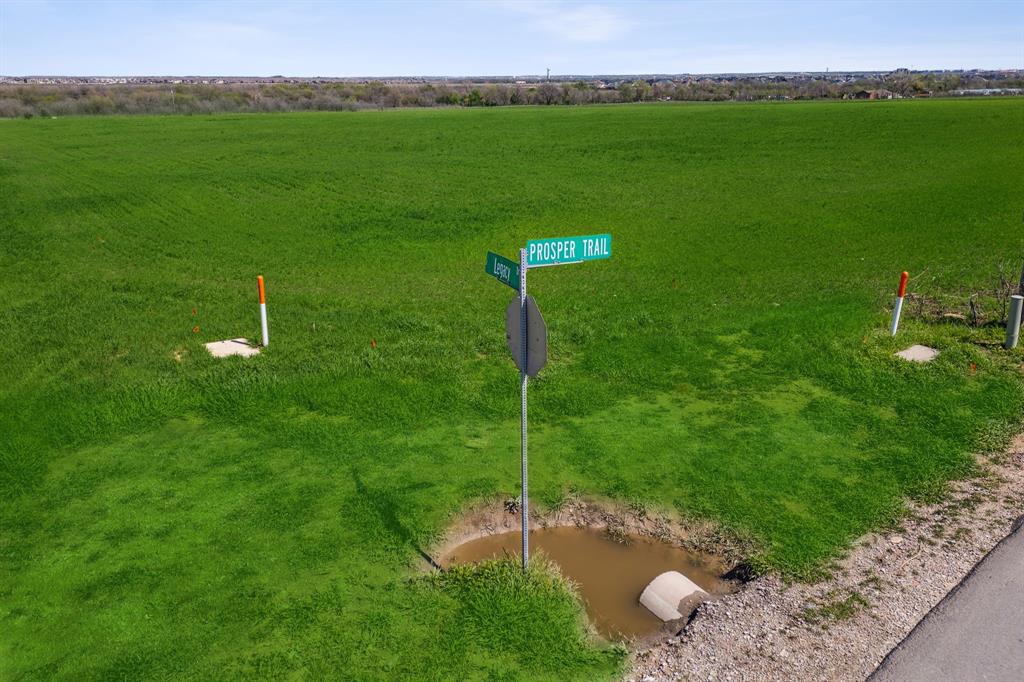 Tbd Legacy Drive Prosper, TX 75078 - Photo 5 of 16 a backyard of a house with lots of green space