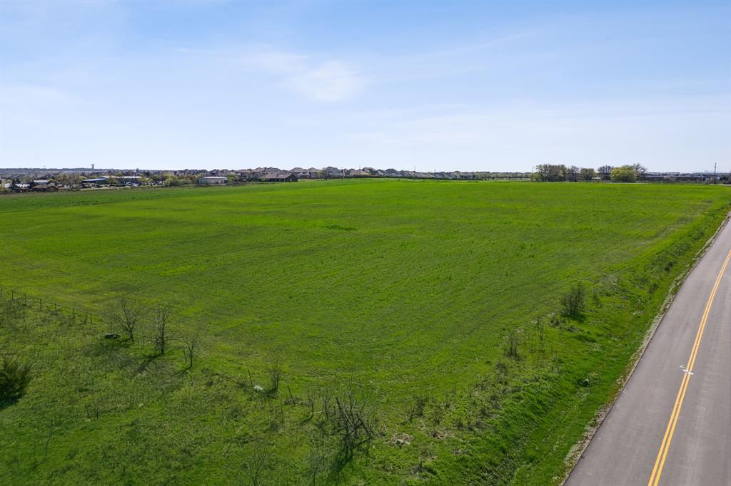 Tbd Legacy Drive Prosper, TX 75078 - Photo 7 of 16 a view of a grassy area