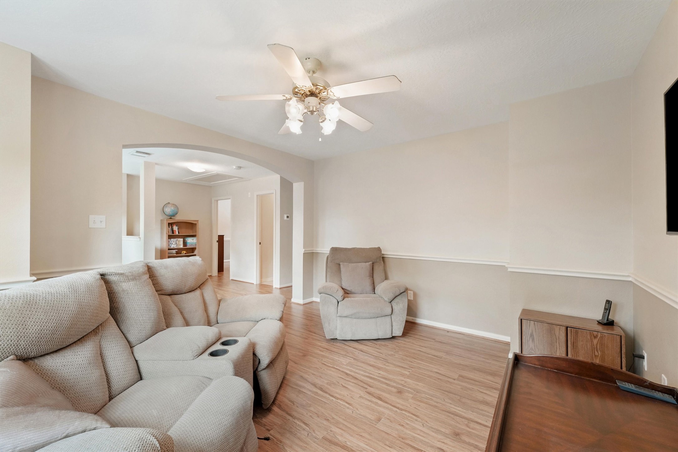6803 Treaschwig Road Spring, TX 77373 - Photo 11 of 22 a living room with furniture and a wooden floor