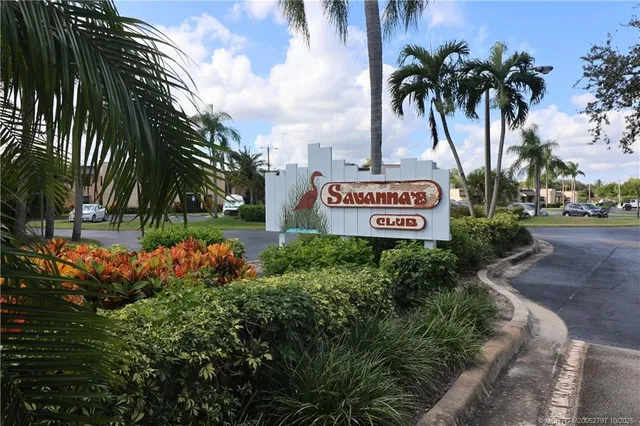 a sign on the side of the road