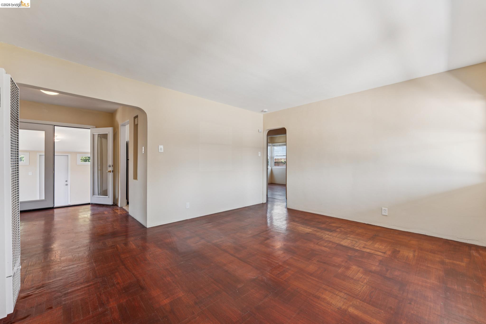 2879 Rheem Avenue Richmond, CA 94804 - Photo 8 of 45 Spacious interior with wood-finish flooring, light neutral wall tones, and recessed lighting