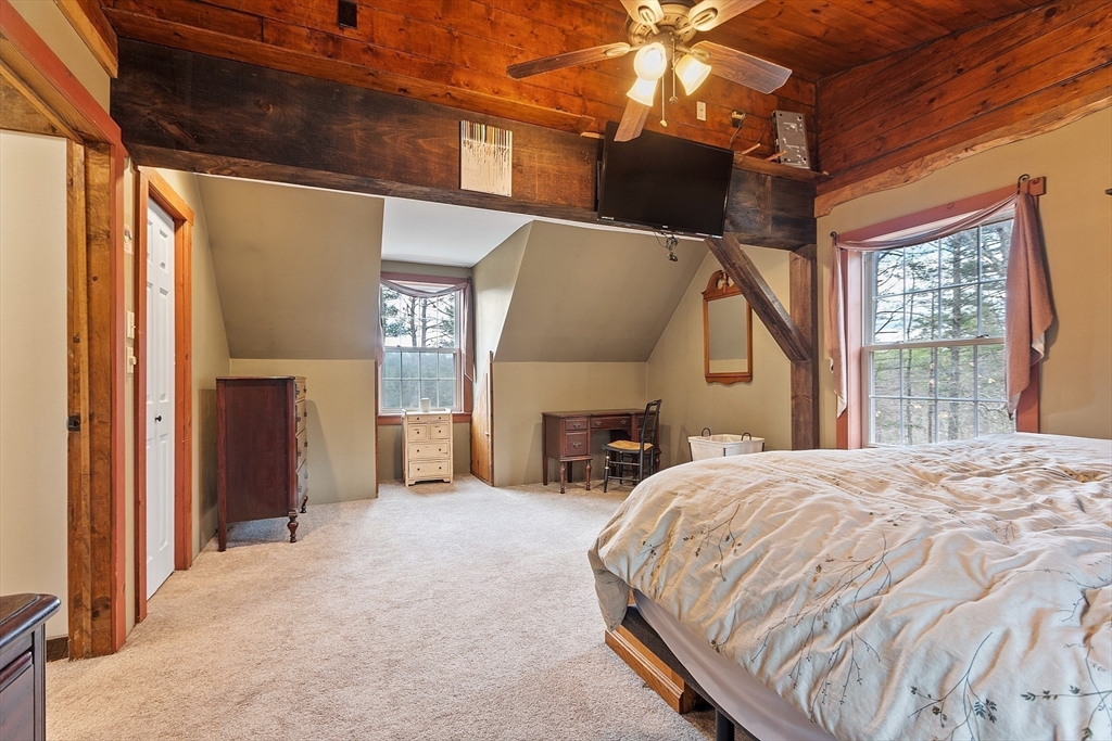 32 East Rindge Road Ashburnham, MA 01430 - Photo 16 of 31 a bed room with a bed and a tv