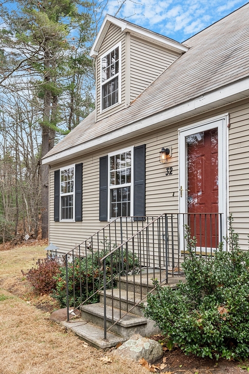 32 East Rindge Road Ashburnham, MA 01430 - Photo 3 of 31 a front view of a house with a garden