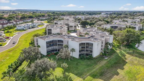 an aerial view of a house with a garden
