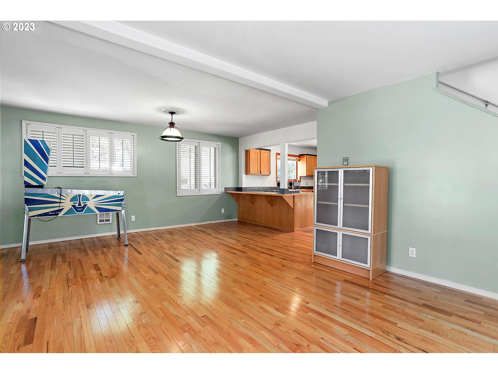 362 Snowden Road White Salmon, WA 98672 - Photo 7 of 48 a view of empty room with wooden floor and window