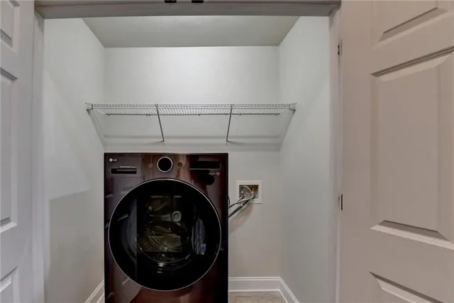 an empty room with a empty space and windows