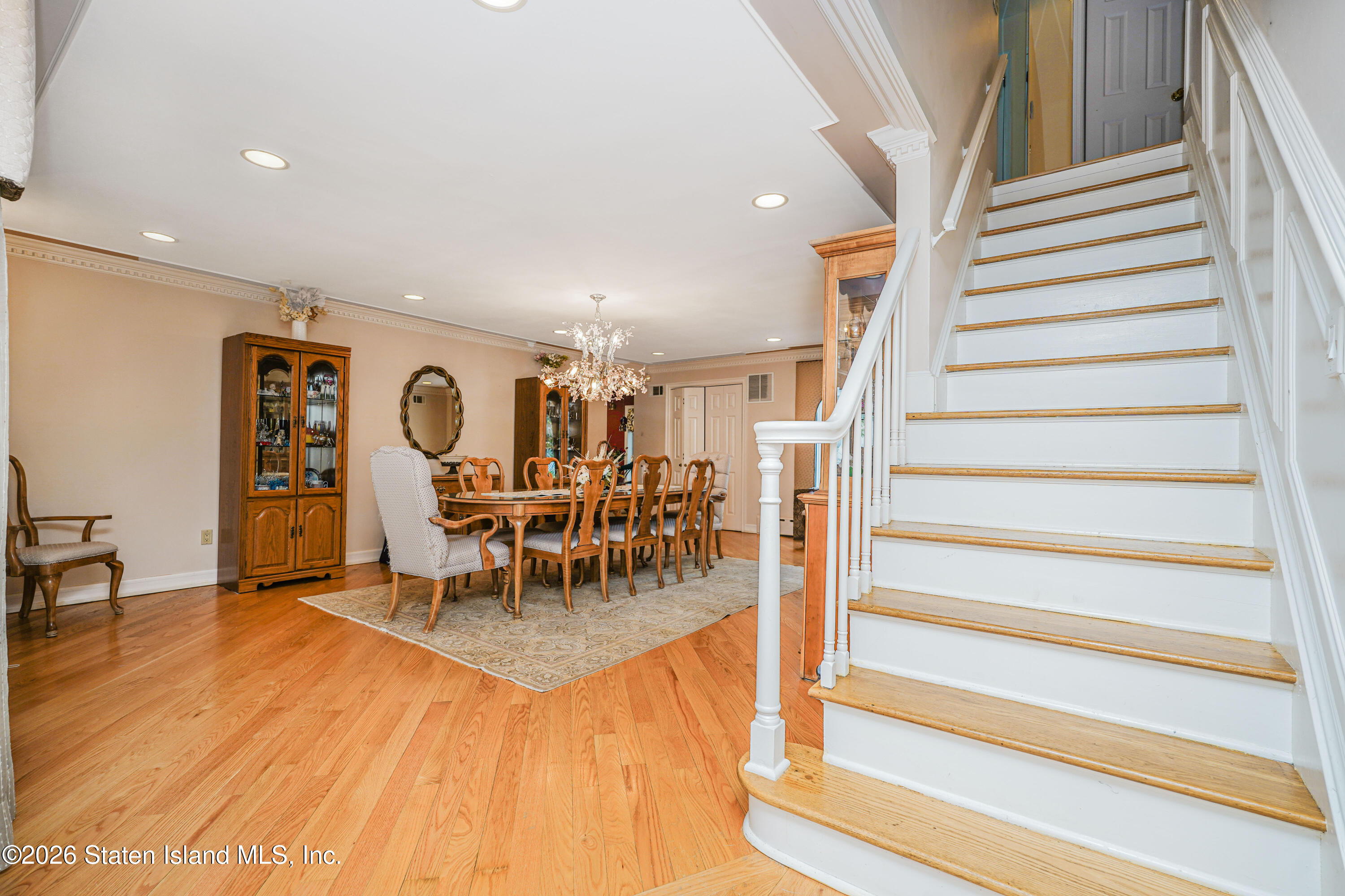 26 Highpoint Road Staten Island, NY 10304 - Photo 11 of 49 a view of a livingroom with furniture and white walls