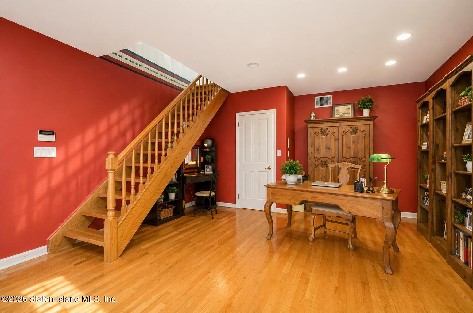 26 Highpoint Road Staten Island, NY 10304 - Photo 24 of 49 a view of entryway livingroom and hall with wooden floor