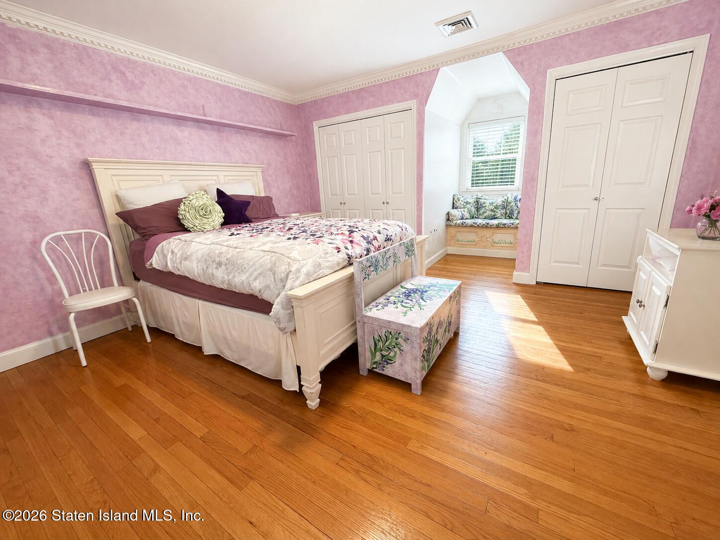 26 Highpoint Road Staten Island, NY 10304 - Photo 26 of 49 a bed room with a bed and a chair