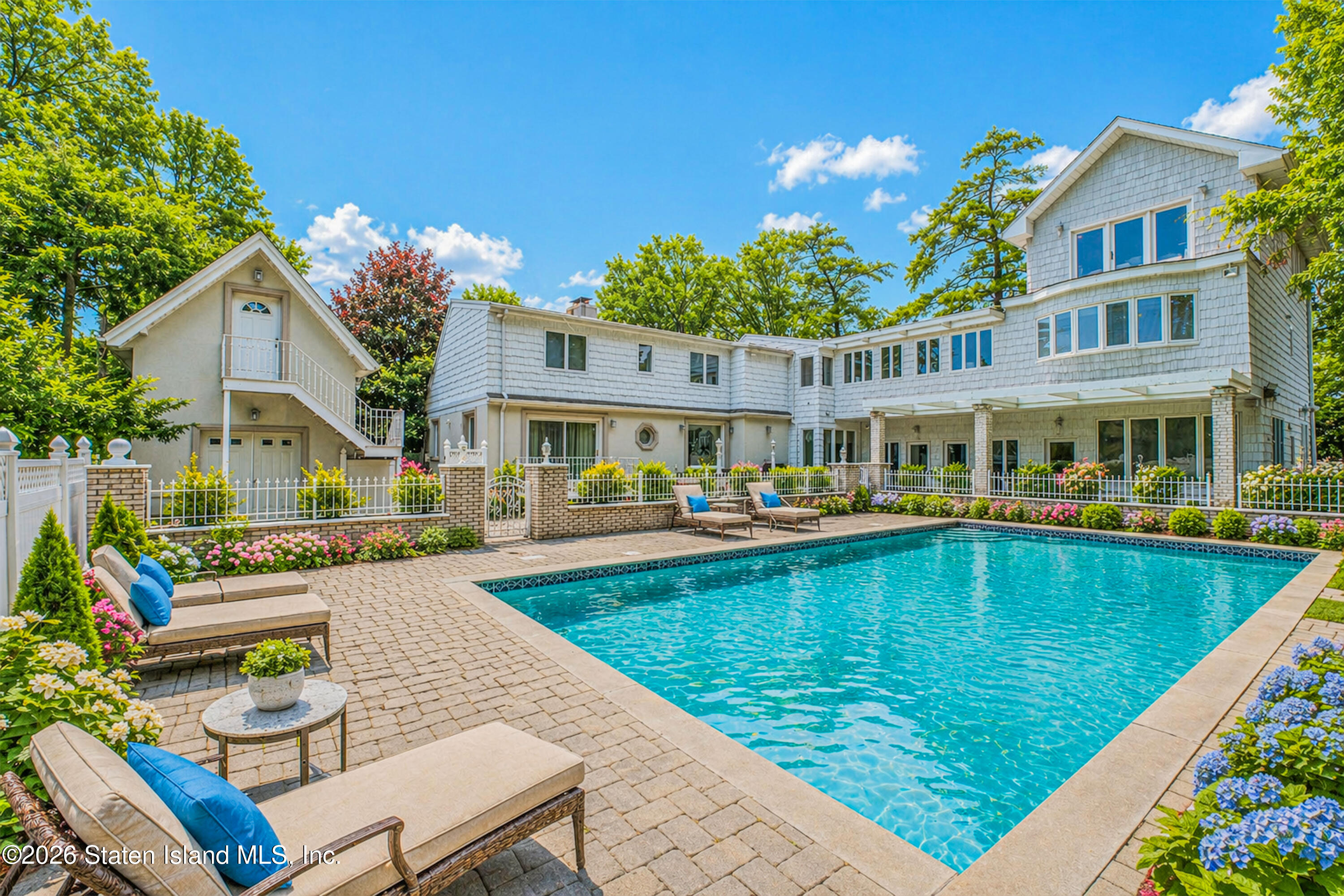 26 Highpoint Road Staten Island, NY 10304 - Photo 41 of 49 a view of a swimming pool with a patio