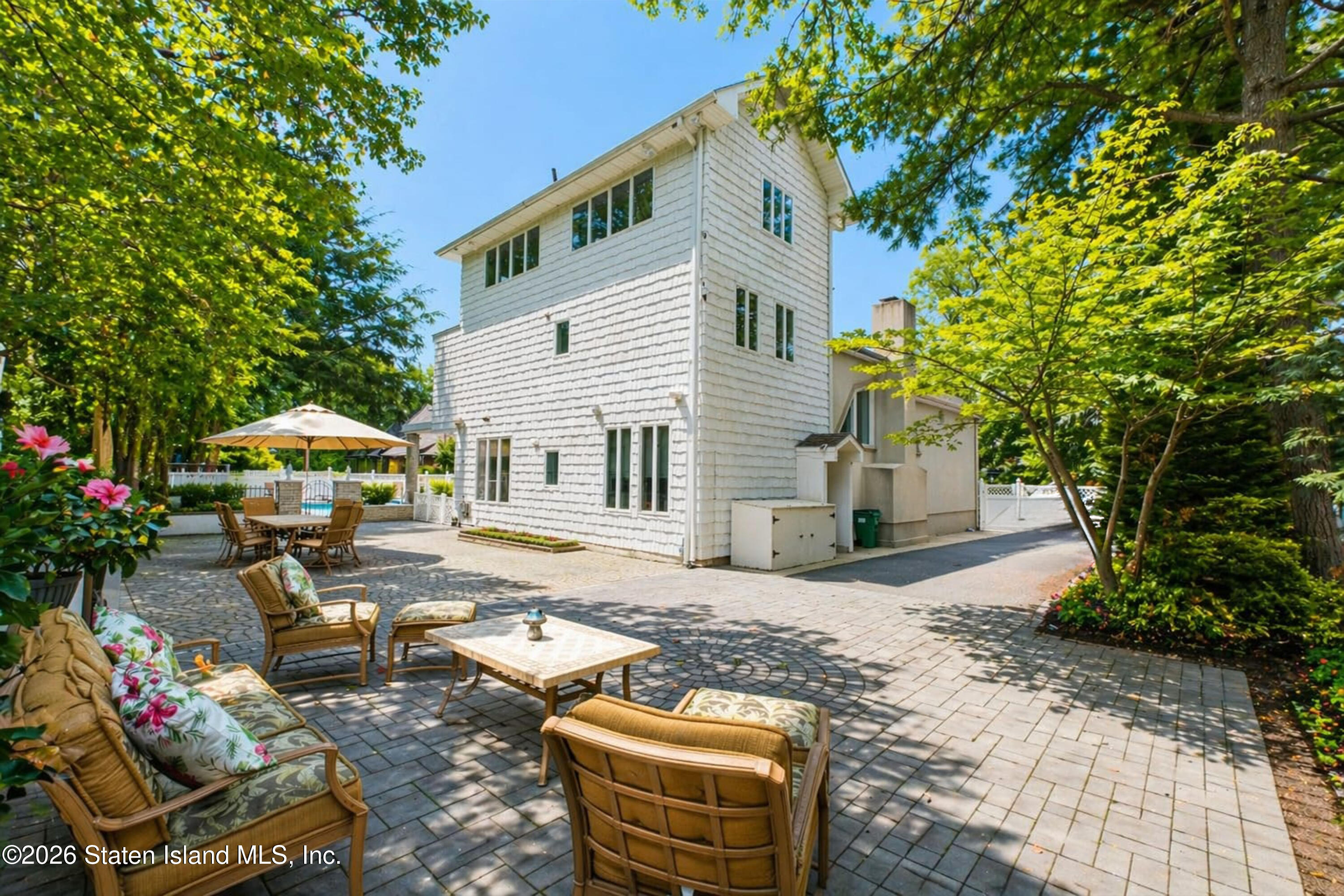 26 Highpoint Road Staten Island, NY 10304 - Photo 43 of 49 a front view of a house with garden