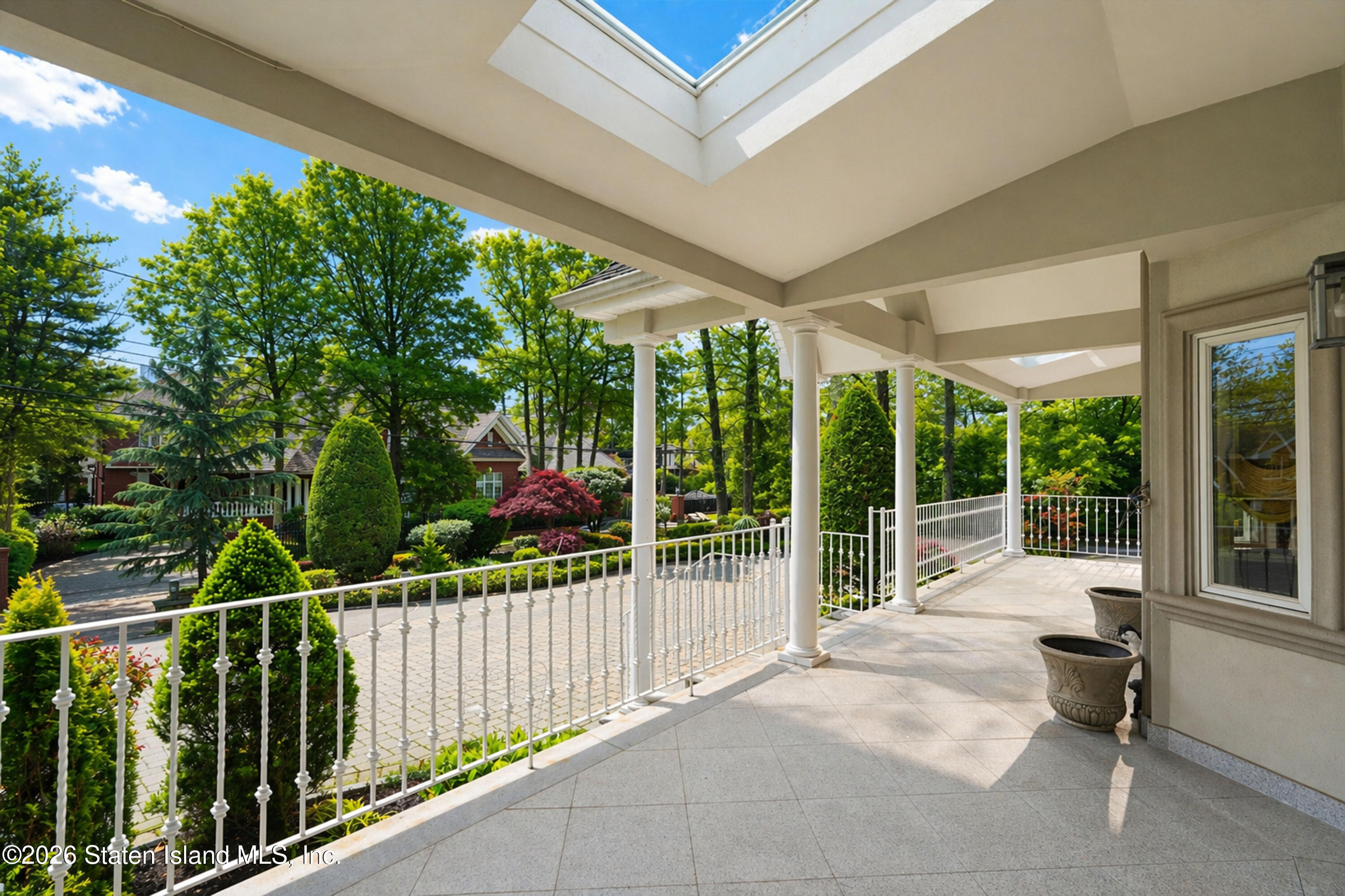 26 Highpoint Road Staten Island, NY 10304 - Photo 9 of 49 a view of a patio with a large window